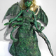 Illustration for article titled In her dream house at Rlyeh, dead Cthulhu Barbie waits dreaming